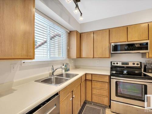 3623 30 Avenue, Edmonton, AB - Indoor Photo Showing Kitchen With Double Sink