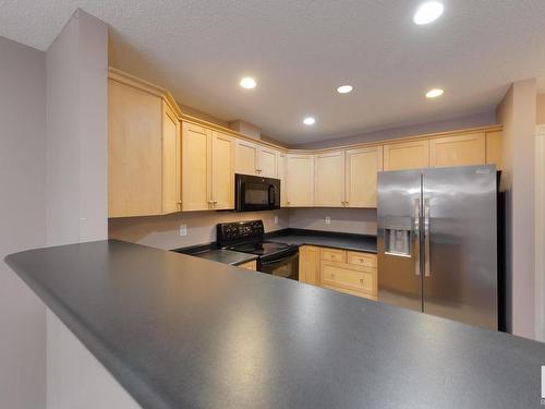 202 12110 106 Avenue, Edmonton, AB - Indoor Photo Showing Kitchen With Double Sink