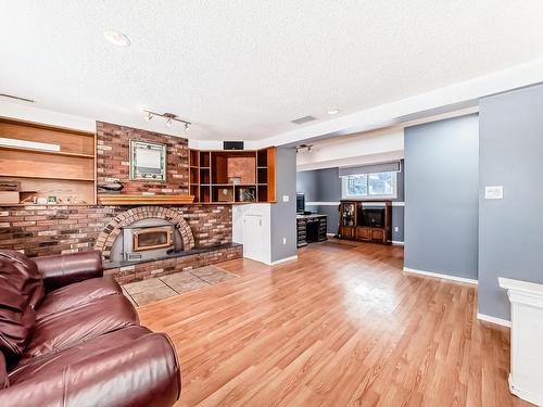 4515 20A Avenue, Edmonton, AB - Indoor Photo Showing Other Room With Fireplace