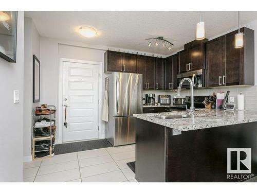 333 5151 Windermere Boulevard, Edmonton, AB - Indoor Photo Showing Kitchen With Stainless Steel Kitchen With Upgraded Kitchen