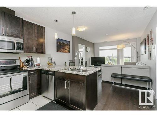 333 5151 Windermere Boulevard, Edmonton, AB - Indoor Photo Showing Kitchen With Double Sink