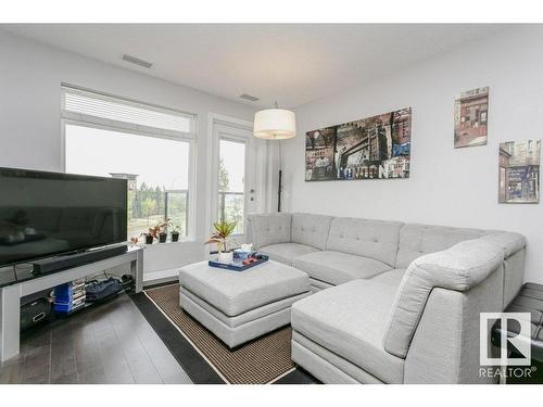 333 5151 Windermere Boulevard, Edmonton, AB - Indoor Photo Showing Living Room