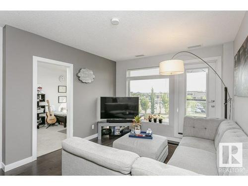 333 5151 Windermere Boulevard, Edmonton, AB - Indoor Photo Showing Living Room