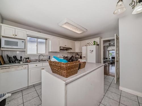 4126 33A Avenue, Edmonton, AB - Indoor Photo Showing Kitchen With Double Sink