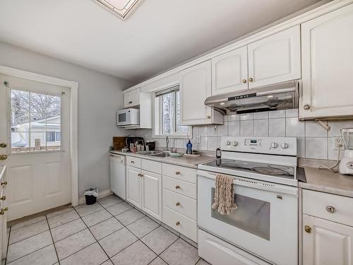 4126 33A Avenue, Edmonton, AB - Indoor Photo Showing Kitchen With Double Sink