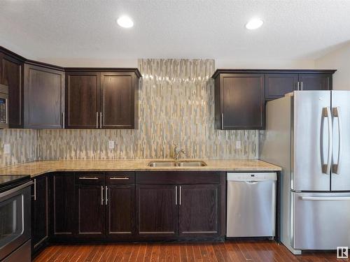 9648 106 Avenue, Edmonton, AB - Indoor Photo Showing Kitchen With Double Sink