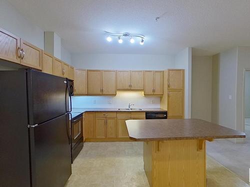 127 2503 Hanna Crescent, Edmonton, AB - Indoor Photo Showing Kitchen With Double Sink