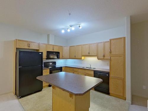 127 2503 Hanna Crescent, Edmonton, AB - Indoor Photo Showing Kitchen With Double Sink