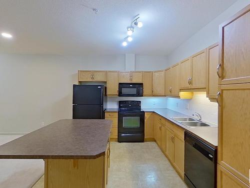 127 2503 Hanna Crescent, Edmonton, AB - Indoor Photo Showing Kitchen With Double Sink