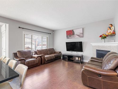 7728 18 Avenue, Edmonton, AB - Indoor Photo Showing Living Room With Fireplace