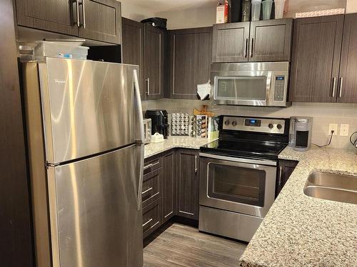 216 3670 139 Avenue, Edmonton, AB - Indoor Photo Showing Kitchen With Stainless Steel Kitchen With Double Sink With Upgraded Kitchen