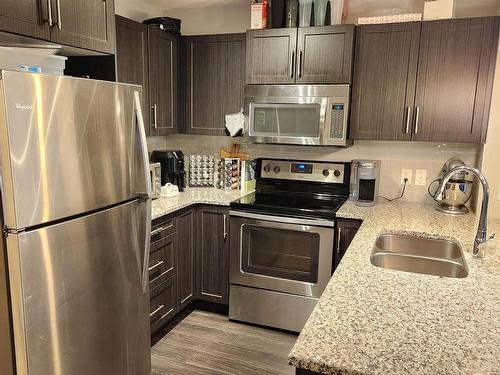 216 3670 139 Avenue, Edmonton, AB - Indoor Photo Showing Kitchen With Stainless Steel Kitchen With Double Sink With Upgraded Kitchen