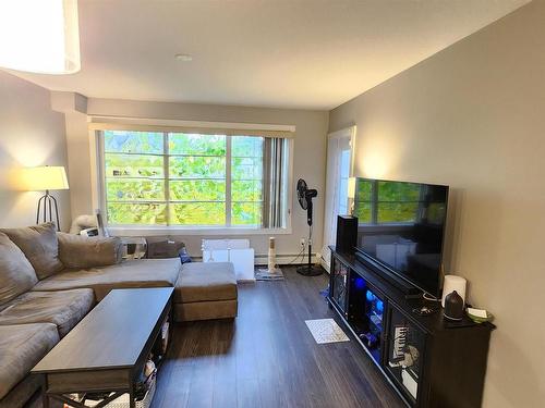 216 3670 139 Avenue, Edmonton, AB - Indoor Photo Showing Living Room