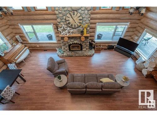 302 52249 Rge Road 222, Rural Strathcona County, AB - Indoor Photo Showing Living Room With Fireplace