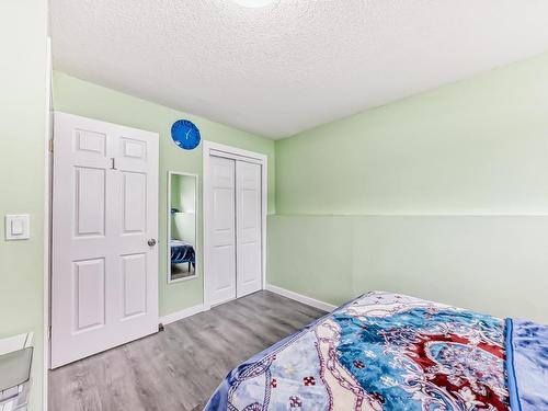 5112 14 Avenue, Edmonton, AB - Indoor Photo Showing Bedroom