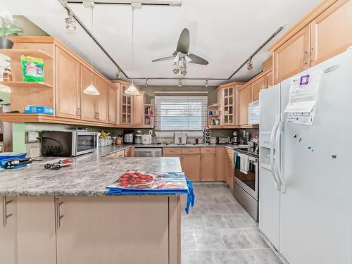 5112 14 Avenue, Edmonton, AB - Indoor Photo Showing Kitchen With Double Sink