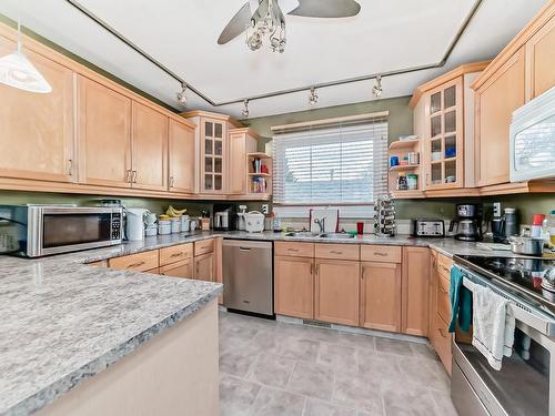 5112 14 Avenue, Edmonton, AB - Indoor Photo Showing Kitchen With Double Sink