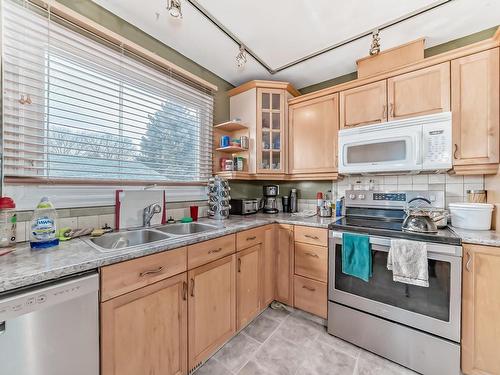 5112 14 Avenue, Edmonton, AB - Indoor Photo Showing Kitchen With Double Sink