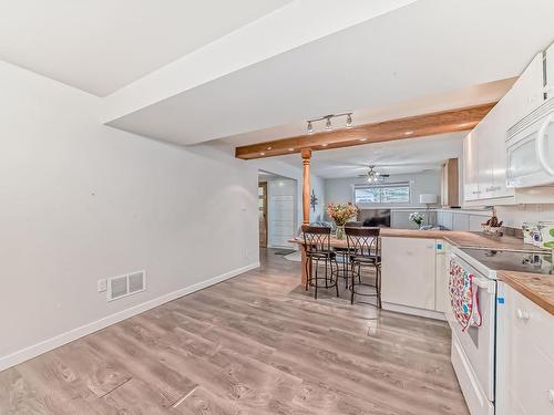 5112 14 Avenue, Edmonton, AB - Indoor Photo Showing Kitchen With Double Sink