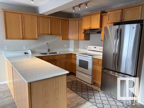 9081 Scott Crescent, Edmonton, AB - Indoor Photo Showing Kitchen With Double Sink