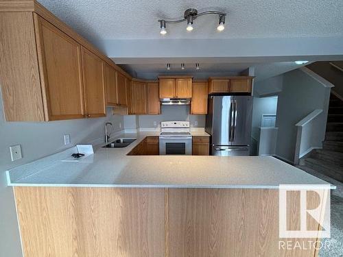 9081 Scott Crescent, Edmonton, AB - Indoor Photo Showing Kitchen With Double Sink