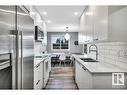 108 5125 Riverbend Road, Edmonton, AB  - Indoor Photo Showing Kitchen With Double Sink With Upgraded Kitchen 