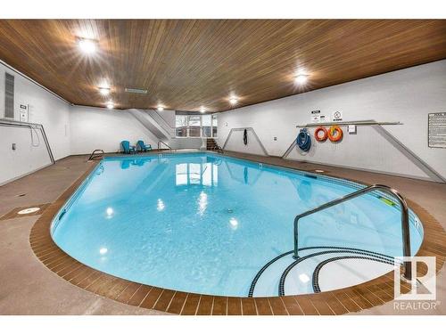 108 5125 Riverbend Road, Edmonton, AB - Indoor Photo Showing Other Room With In Ground Pool