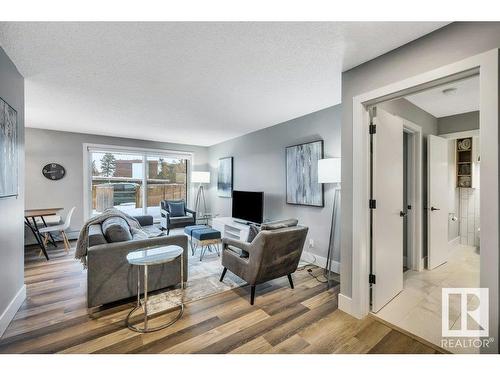 108 5125 Riverbend Road, Edmonton, AB - Indoor Photo Showing Living Room