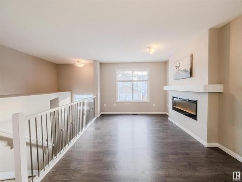 37 4050 Savaryn Drive, Edmonton, AB - Indoor With Fireplace