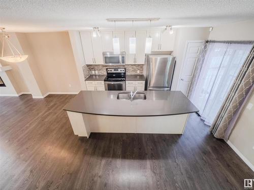 37 4050 Savaryn Drive, Edmonton, AB - Indoor Photo Showing Kitchen With Stainless Steel Kitchen With Double Sink