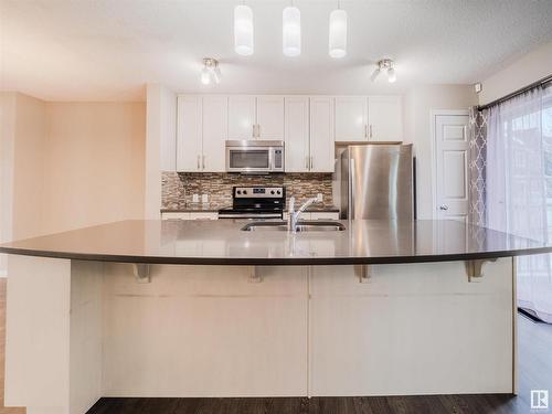 37 4050 Savaryn Drive, Edmonton, AB - Indoor Photo Showing Kitchen With Stainless Steel Kitchen With Double Sink With Upgraded Kitchen