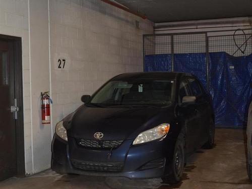 111 11445 Ellerslie Road Sw, Edmonton, AB - Indoor Photo Showing Garage