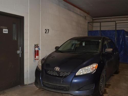 111 11445 Ellerslie Road Sw, Edmonton, AB - Indoor Photo Showing Garage