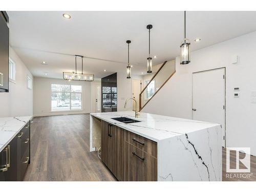 7607 98 Avenue, Edmonton, AB - Indoor Photo Showing Kitchen With Double Sink With Upgraded Kitchen