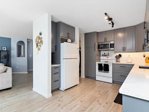 212 15499 Castle Downs Road, Edmonton, AB - Indoor Photo Showing Kitchen With Double Sink