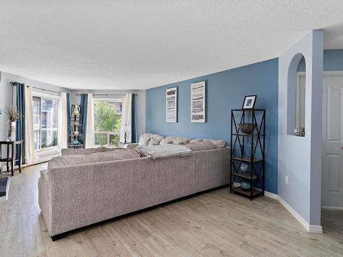 212 15499 Castle Downs Road, Edmonton, AB - Indoor Photo Showing Living Room