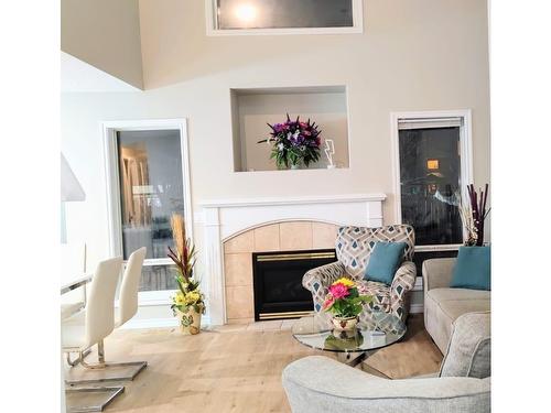 8 Foxhaven Crescent, Sherwood Park, AB - Indoor Photo Showing Living Room With Fireplace