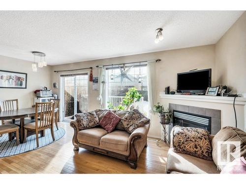 29 12104 16 Avenue, Edmonton, AB - Indoor Photo Showing Living Room With Fireplace