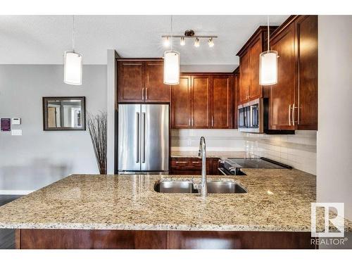 115 812 Welsh Drive, Edmonton, AB - Indoor Photo Showing Kitchen With Stainless Steel Kitchen With Double Sink With Upgraded Kitchen