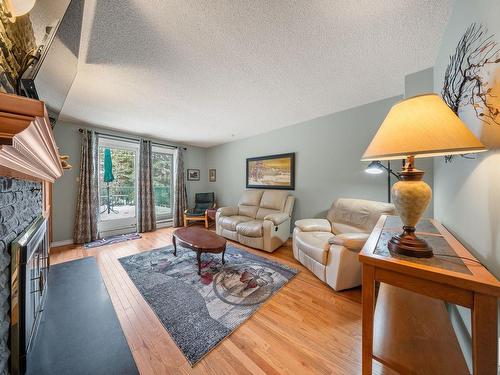 8107 138 Street, Edmonton, AB - Indoor Photo Showing Living Room With Fireplace