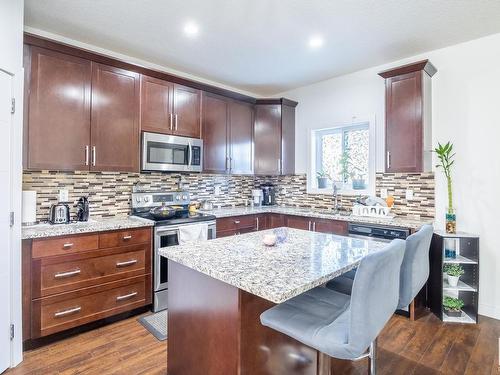 9201 Cooper Crescent Sw, Edmonton, AB - Indoor Photo Showing Kitchen With Upgraded Kitchen