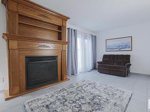 13844 24 Street, Edmonton, AB - Indoor Photo Showing Living Room With Fireplace