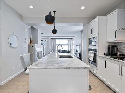 703 Secord Boulevard, Edmonton, AB - Indoor Photo Showing Kitchen With Double Sink With Upgraded Kitchen