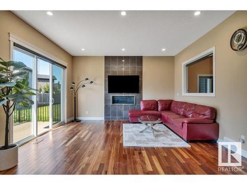 1211 Adamson Drive, Edmonton, AB - Indoor Photo Showing Living Room With Fireplace