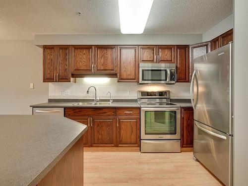 305 8909 100 Street, Edmonton, AB - Indoor Photo Showing Kitchen