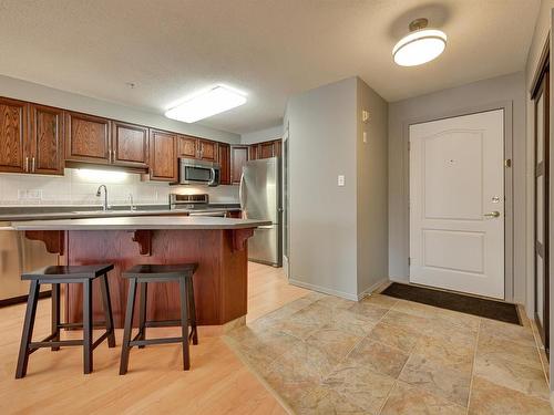 305 8909 100 Street, Edmonton, AB - Indoor Photo Showing Kitchen