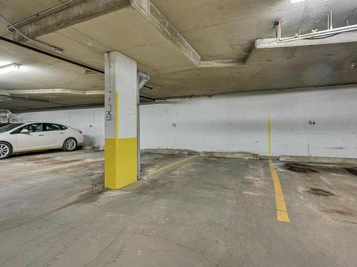 305 8909 100 Street, Edmonton, AB - Indoor Photo Showing Garage