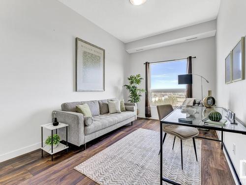 511 1316 Windermere Way, Edmonton, AB - Indoor Photo Showing Living Room