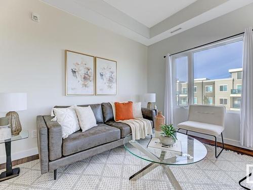 511 1316 Windermere Way, Edmonton, AB - Indoor Photo Showing Living Room