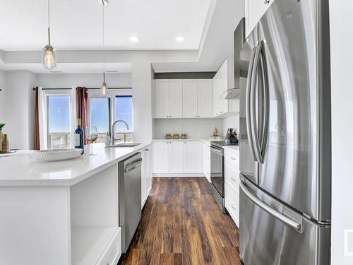 511 1316 Windermere Way, Edmonton, AB - Indoor Photo Showing Kitchen With Stainless Steel Kitchen With Upgraded Kitchen